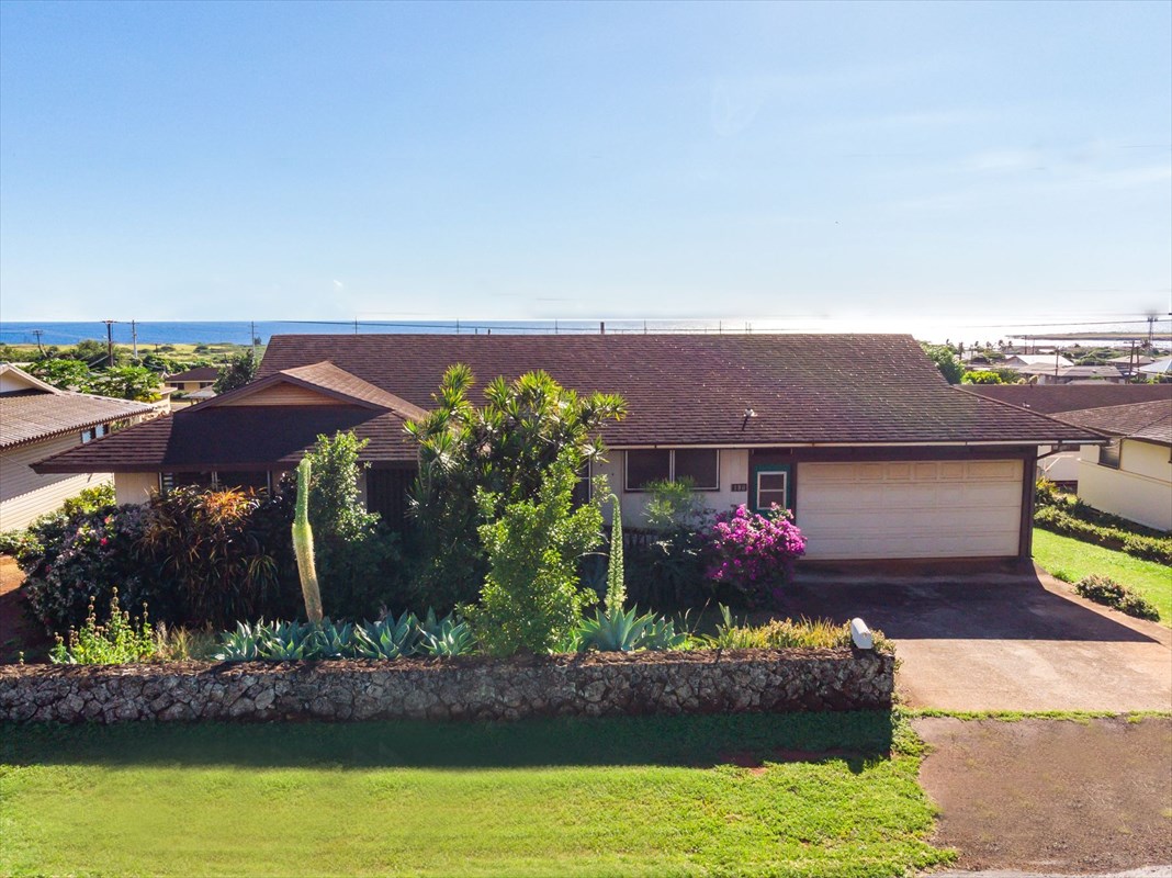 180 Ulaula Road Eleele, HI 96705 - Photo 2 of 23 a front view of a house with a yard