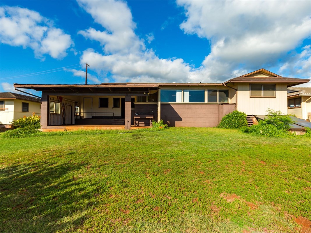 180 Ulaula Road Eleele, HI 96705 - Photo 4 of 23 front view of a house with a yard