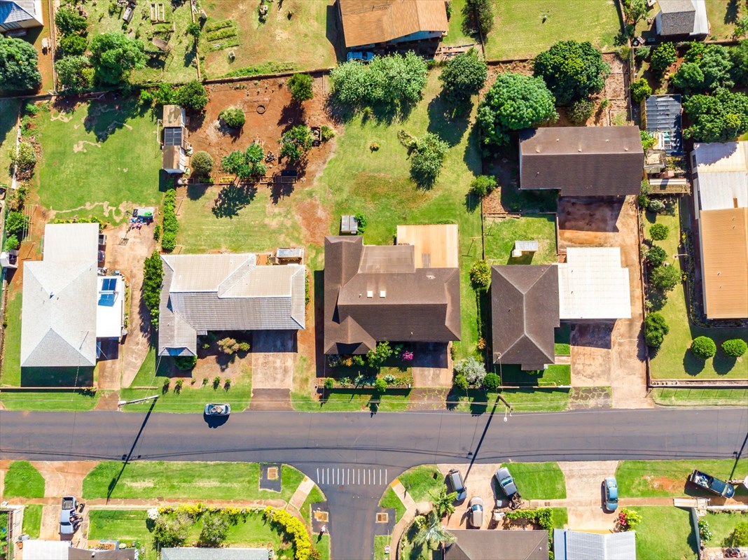 180 Ulaula Road Eleele, HI 96705 - Photo 7 of 23 an aerial view of multiple houses with a yard