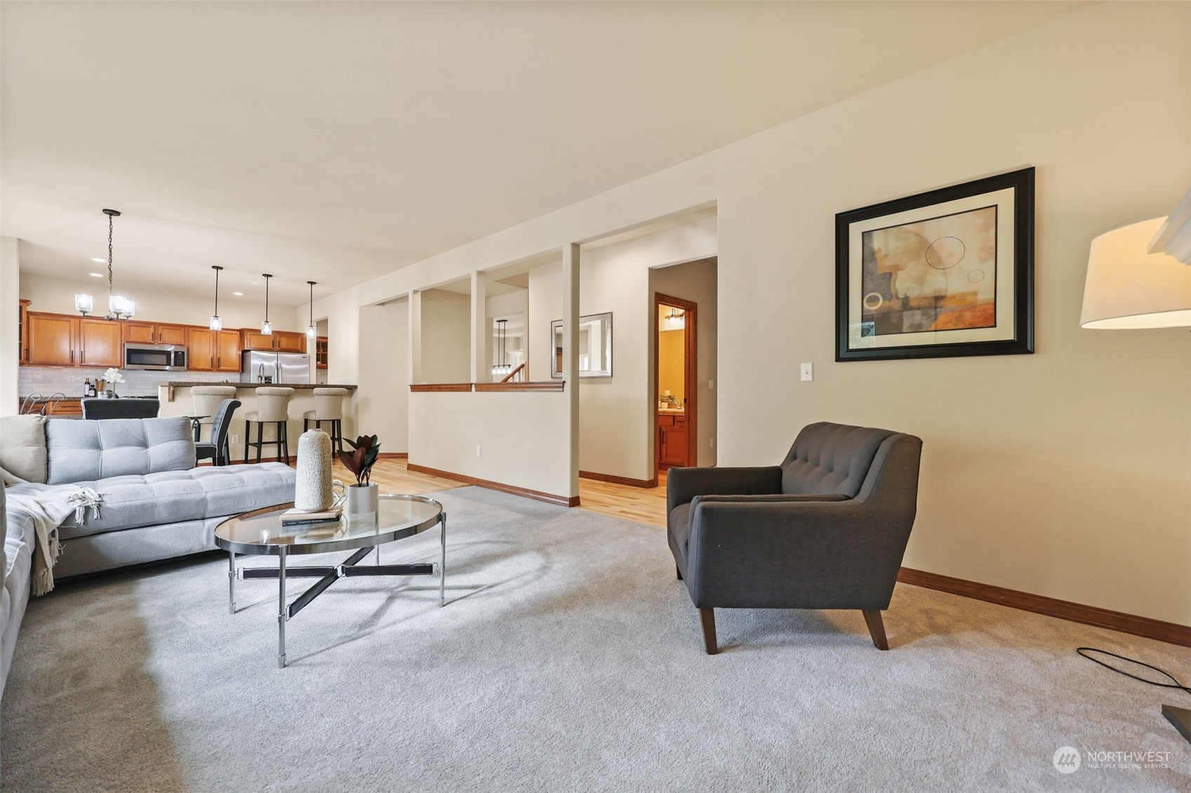 3206 172 Street Southeast Bothell, WA 98012 - Photo 16 of 35 a living room with furniture and a view of kitchen