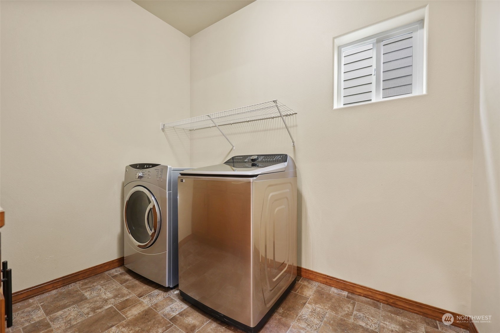 3206 172 Street Southeast Bothell, WA 98012 - Photo 17 of 35 a utility room with dryer and washer