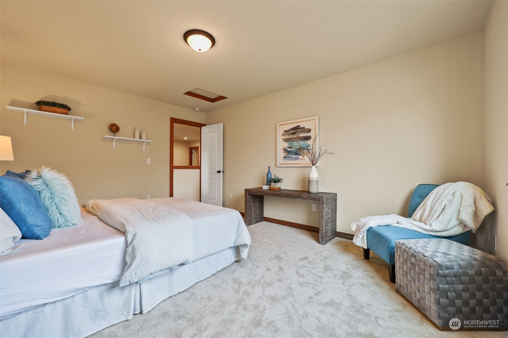 3206 172 Street Southeast Bothell, WA 98012 - Photo 27 of 35 a bedroom with a bed and a couch