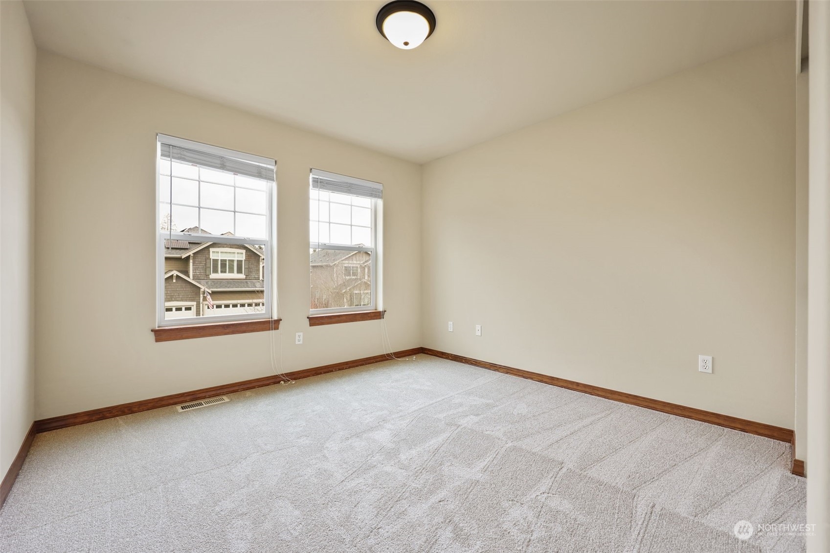 3206 172 Street Southeast Bothell, WA 98012 - Photo 28 of 35 an empty room with windows