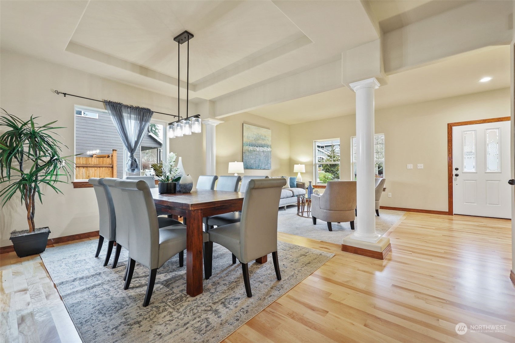 3206 172 Street Southeast Bothell, WA 98012 - Photo 7 of 35 a dining room with furniture window and wooden floor