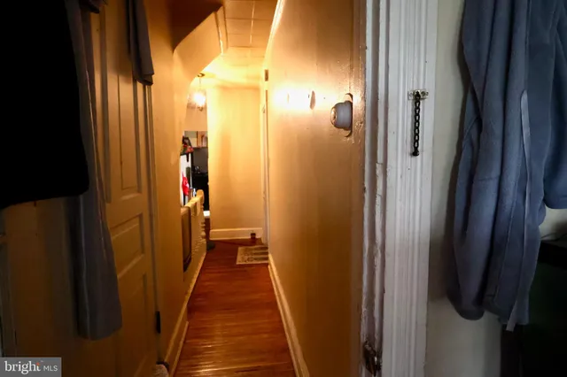 a view of a bathroom from a hallway