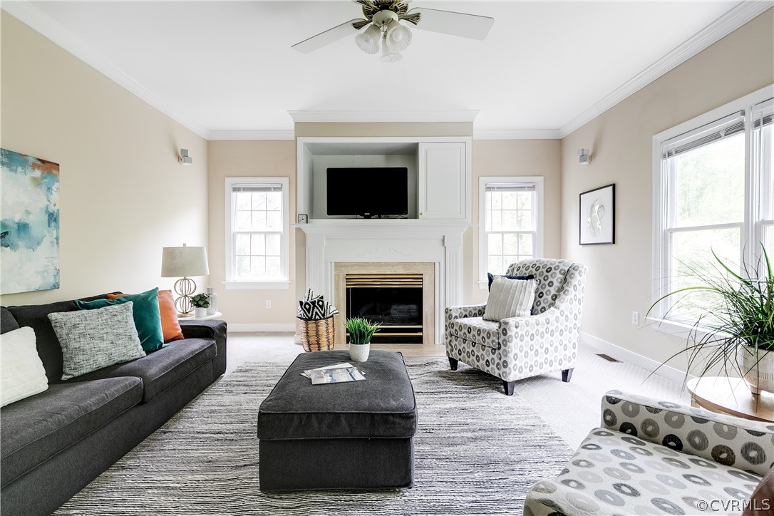 5304 West Shore Road Midlothian, VA 23112 - Photo 11 of 47 a living room with furniture and a fireplace