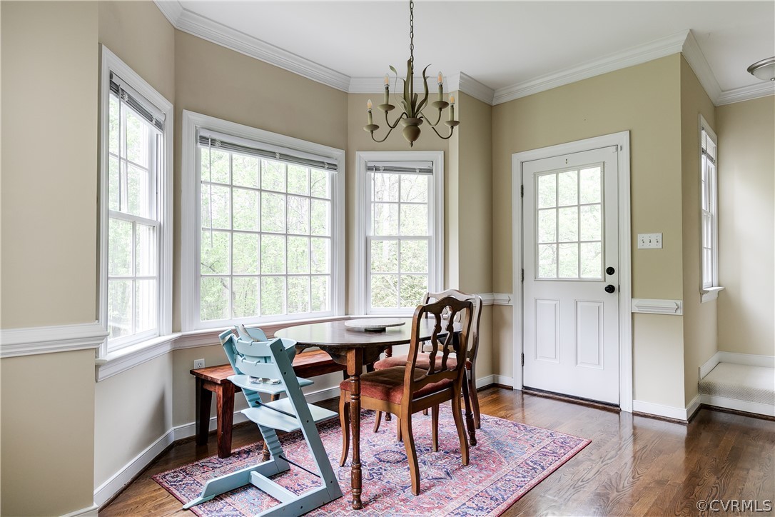5304 West Shore Road Midlothian, VA 23112 - Photo 13 of 47 a view of a dining room with furniture window and wooden floor