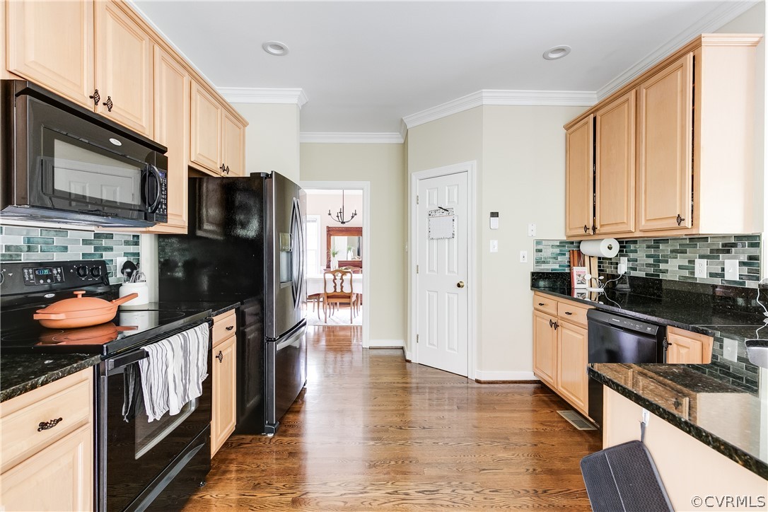 5304 West Shore Road Midlothian, VA 23112 - Photo 15 of 47 a kitchen with stainless steel appliances granite countertop a refrigerator and a stove top oven