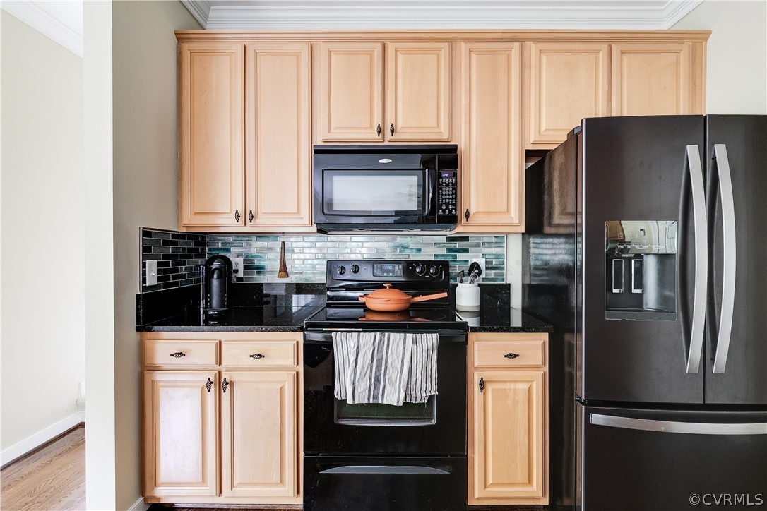 5304 West Shore Road Midlothian, VA 23112 - Photo 16 of 47 a kitchen with stainless steel appliances a refrigerator a stove a microwave and a refrigerator