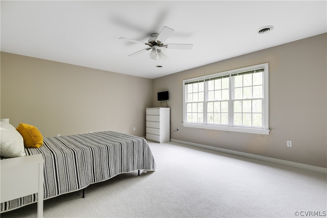 5304 West Shore Road Midlothian, VA 23112 - Photo 19 of 47 a bedroom with a bed and window
