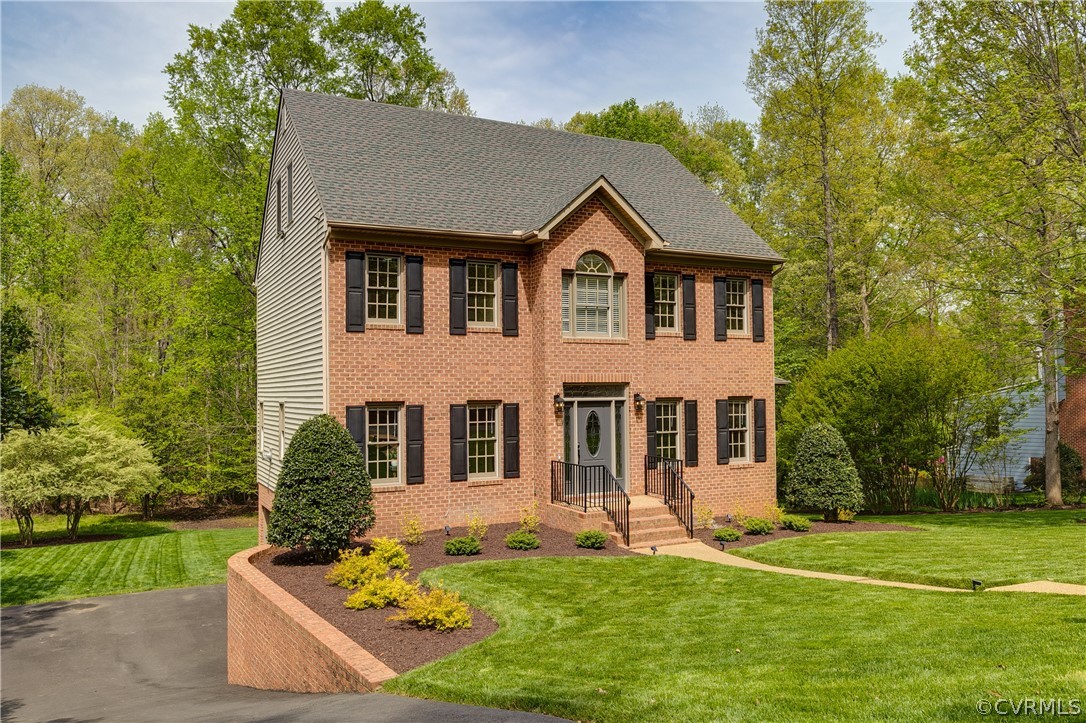 5304 West Shore Road Midlothian, VA 23112 - Photo 2 of 47 front view of a house with a yard
