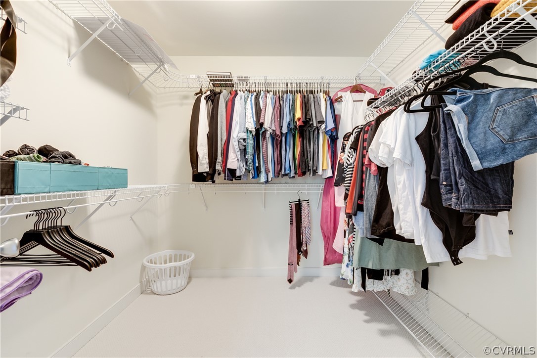 5304 West Shore Road Midlothian, VA 23112 - Photo 24 of 47 a view of walk in closet with clothes and shoes