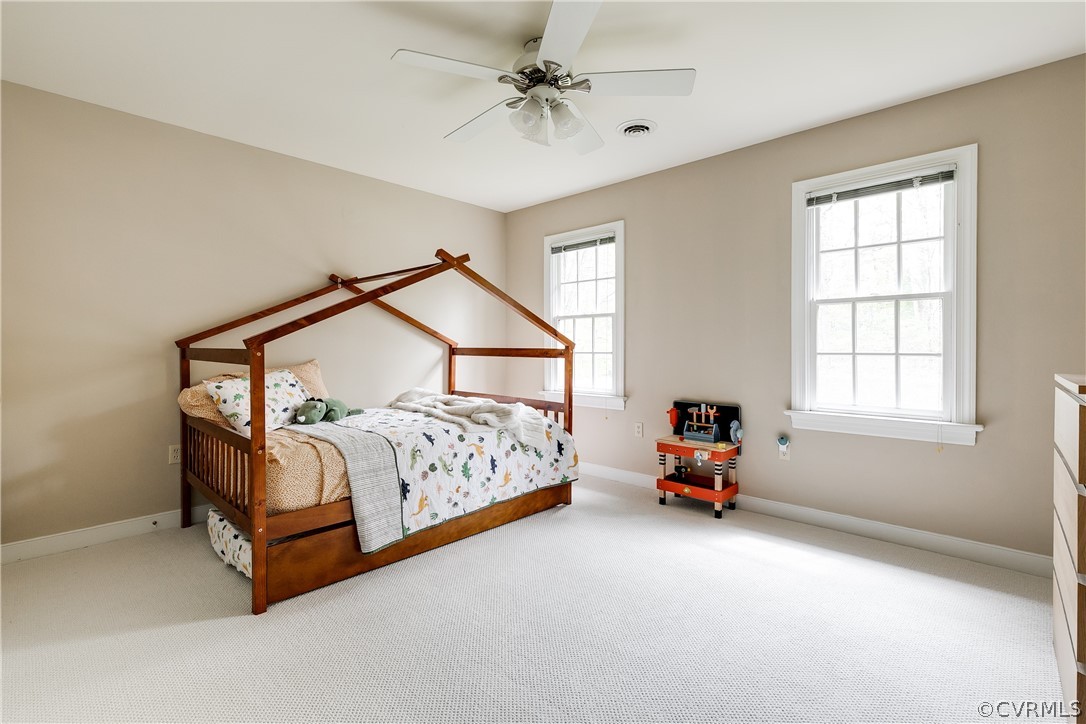5304 West Shore Road Midlothian, VA 23112 - Photo 26 of 47 a bedroom with a bed and window