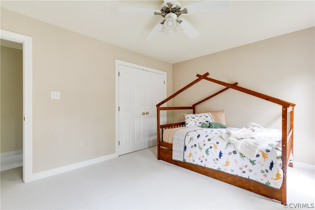 5304 West Shore Road Midlothian, VA 23112 - Photo 27 of 47 a bedroom with bed and wooden floor