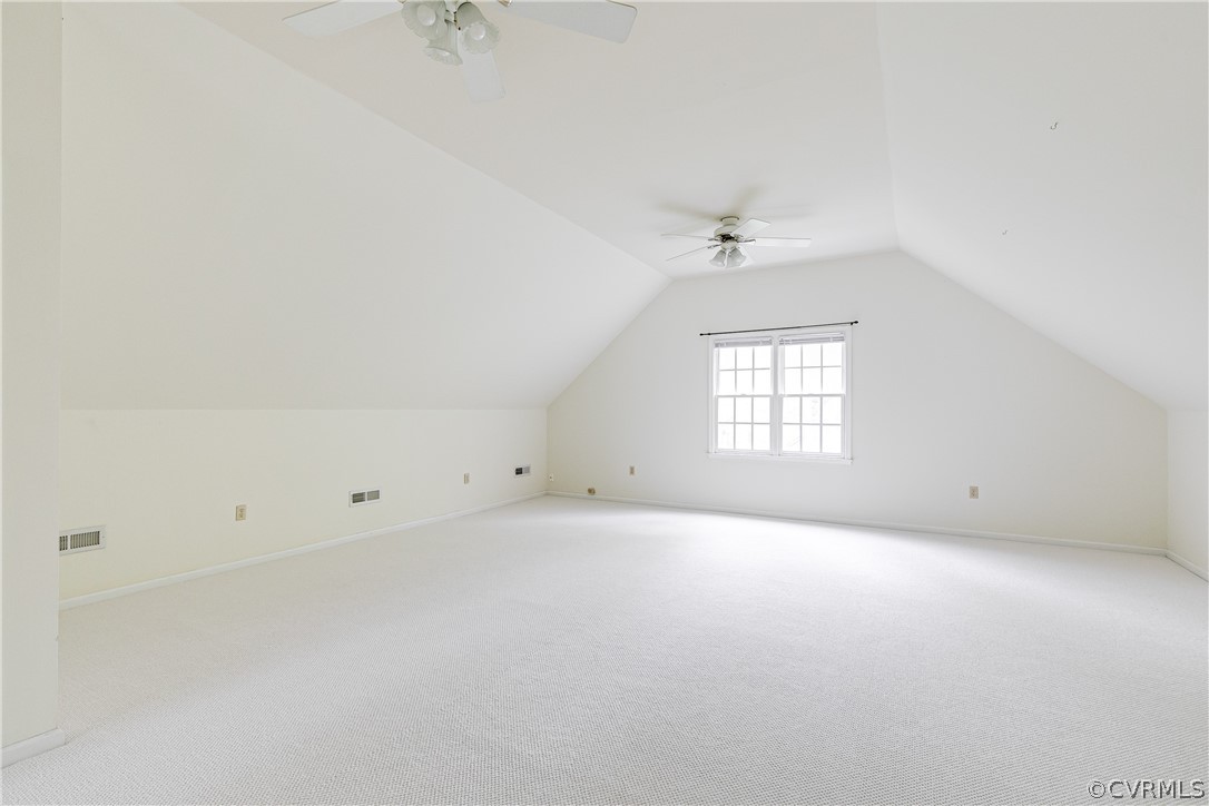 5304 West Shore Road Midlothian, VA 23112 - Photo 33 of 47 an empty room with a window and a ceiling fan
