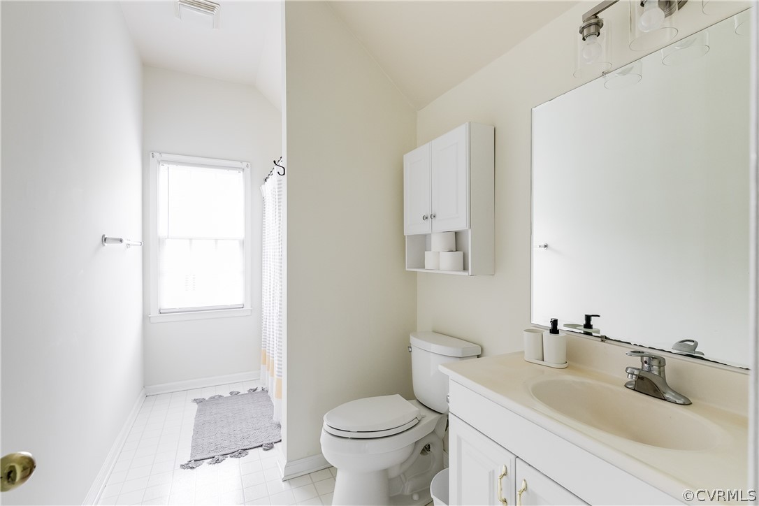 5304 West Shore Road Midlothian, VA 23112 - Photo 35 of 47 a bathroom with a granite countertop toilet sink and mirror