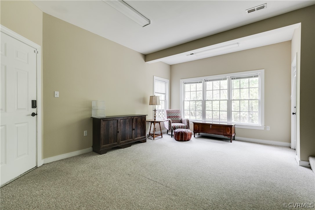 5304 West Shore Road Midlothian, VA 23112 - Photo 37 of 47 an empty room with furniture and a window