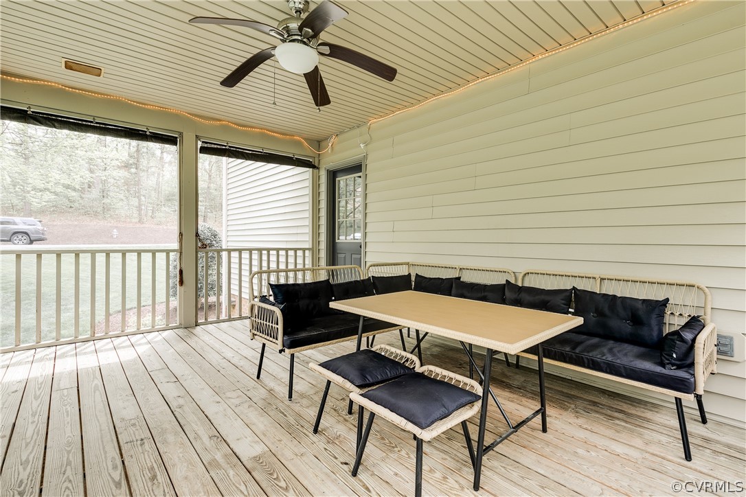 5304 West Shore Road Midlothian, VA 23112 - Photo 41 of 47 a balcony with wooden floor and outdoor seating