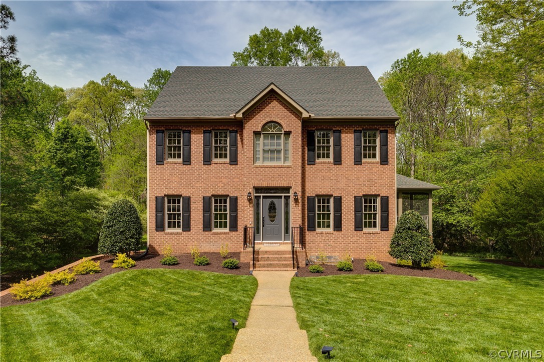 5304 West Shore Road Midlothian, VA 23112 - Photo 47 of 47 front view of a house with a yard