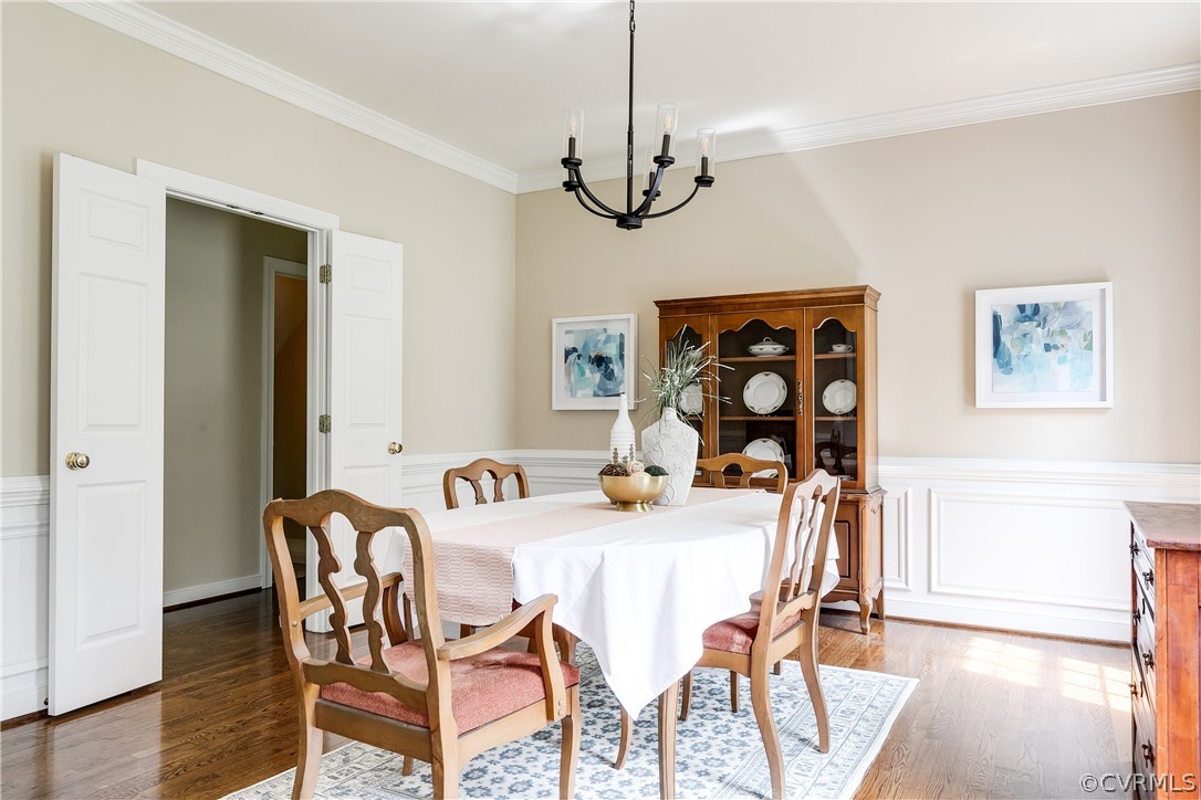 5304 West Shore Road Midlothian, VA 23112 - Photo 7 of 47 a view of a dining room with furniture and wooden floor