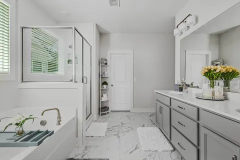 a bathroom with a sink a mirror and a bathtub