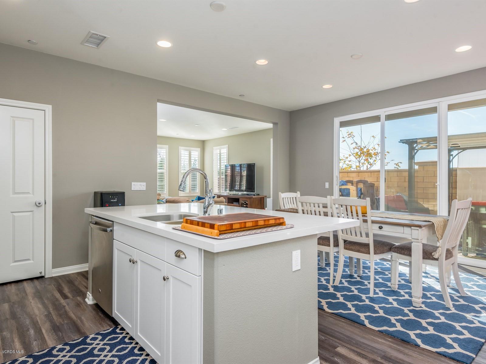287 Stagetrail Road Camarillo, CA 93010 - Photo 12 of 30 a kitchen with stainless steel appliances granite countertop a sink and a stove