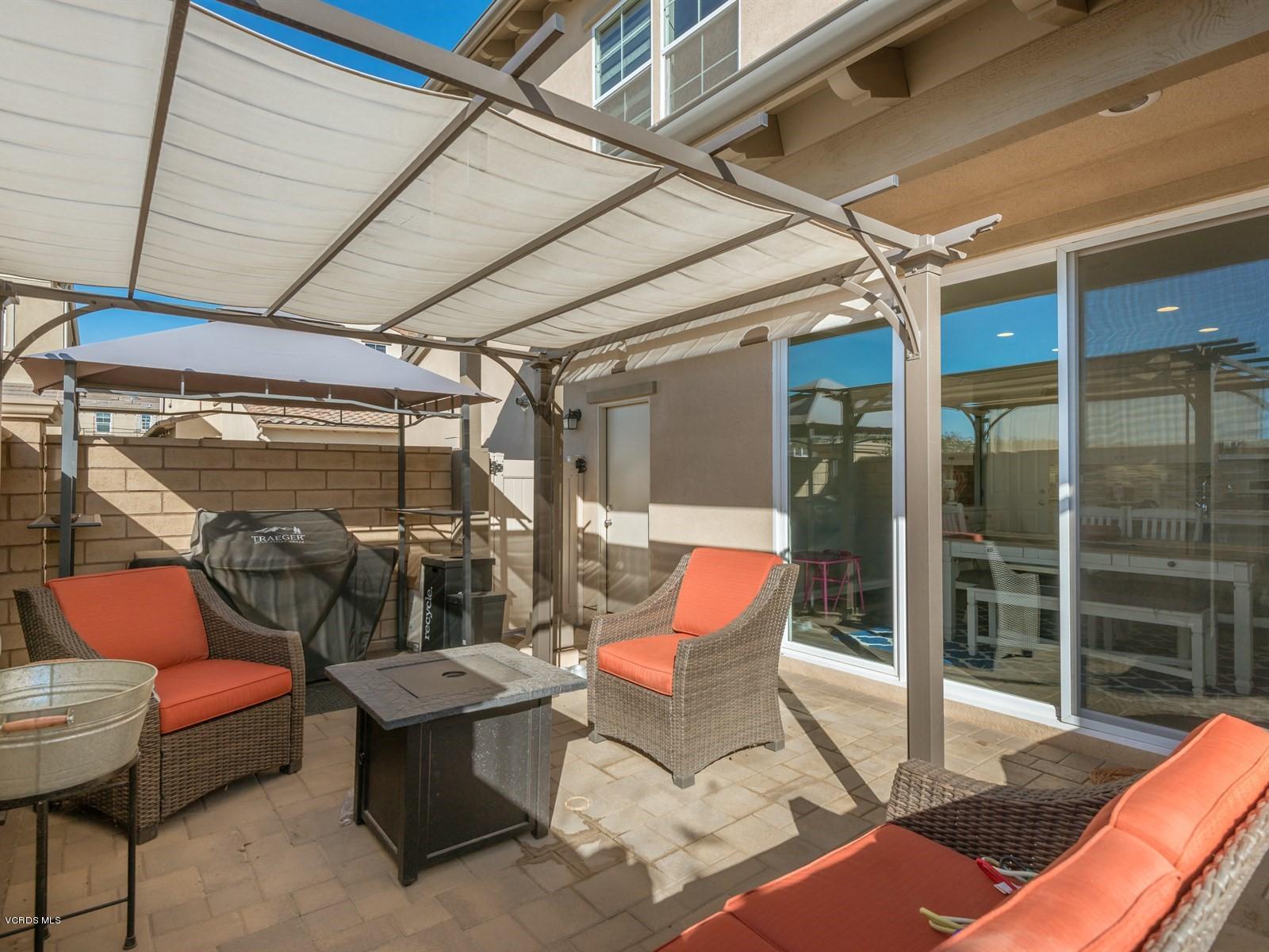 287 Stagetrail Road Camarillo, CA 93010 - Photo 13 of 30 a outdoor space with patio the couches and a dining table with the view of the balcony