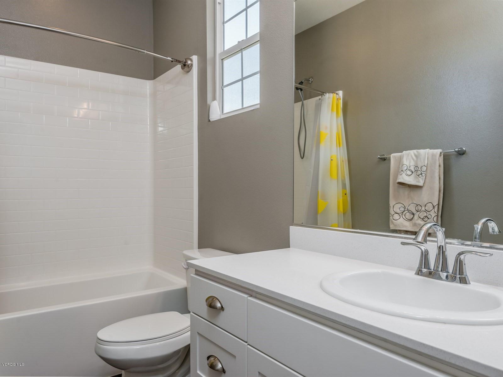 287 Stagetrail Road Camarillo, CA 93010 - Photo 22 of 30 a bathroom with a granite countertop sink toilet and shower