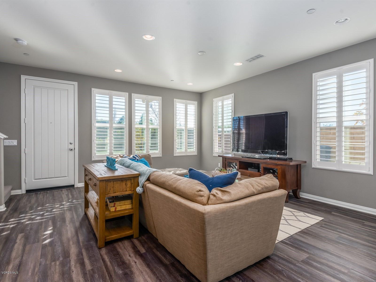 287 Stagetrail Road Camarillo, CA 93010 - Photo 10 of 30 a living room with furniture wooden floor and a flat screen tv