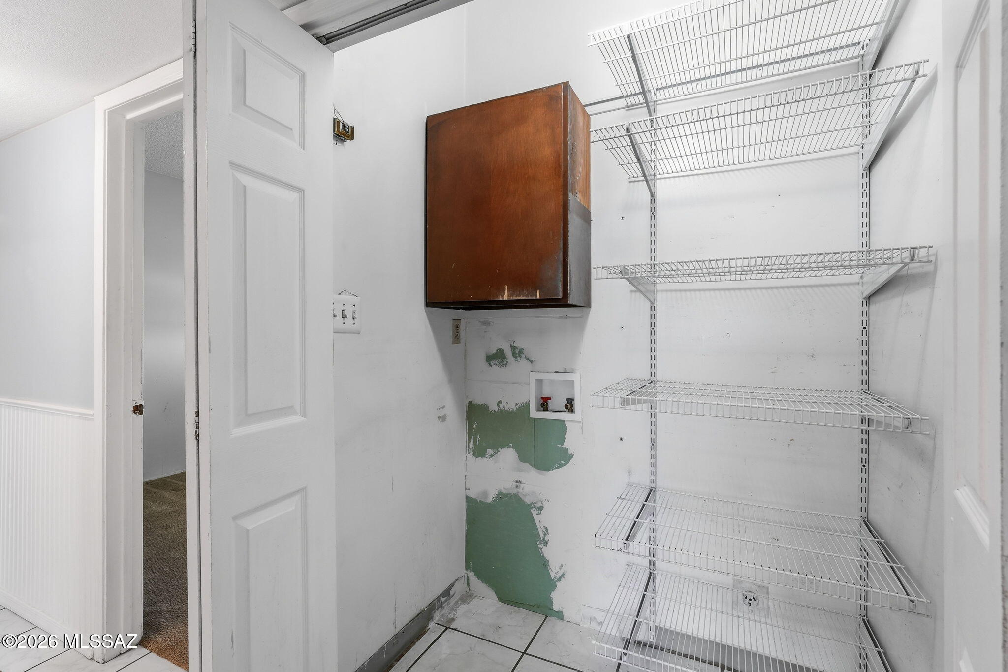 7381 East Stella Road Tucson, AZ 85730 - Photo 23 of 33 Hall Laundry Closet