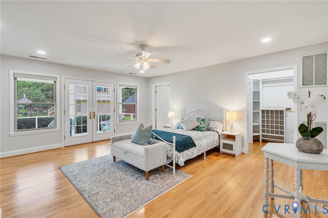 618 Main Street Reedville, VA 22539 - Photo 19 of 54 Spacious room featuring wood flooring, gray walls