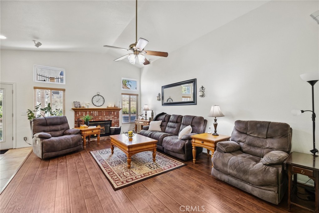 6752 Laurel Brook Drive Riverside, CA 92506 - Photo 13 of 53 a living room with furniture or couch and a wooden floor