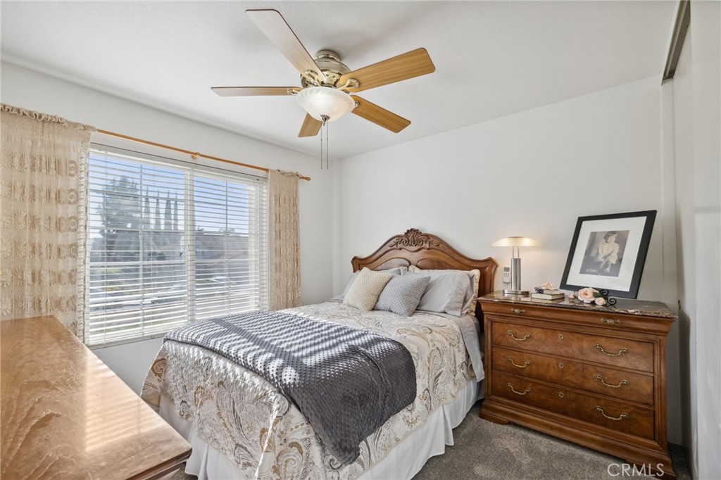 6752 Laurel Brook Drive Riverside, CA 92506 - Photo 34 of 53 a bedroom with a bed and a window