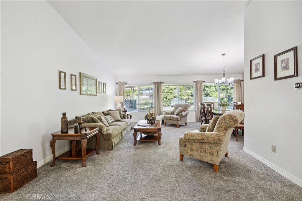 6752 Laurel Brook Drive Riverside, CA 92506 - Photo 7 of 53 a living room with furniture and a large window