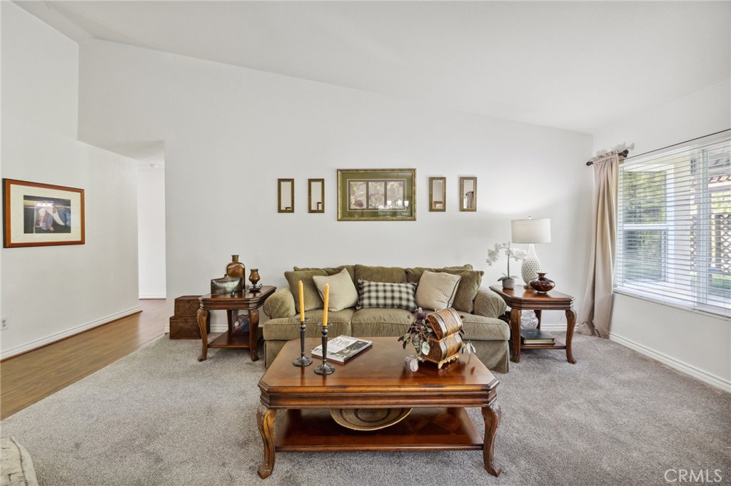 6752 Laurel Brook Drive Riverside, CA 92506 - Photo 10 of 53 a living room with furniture and a window
