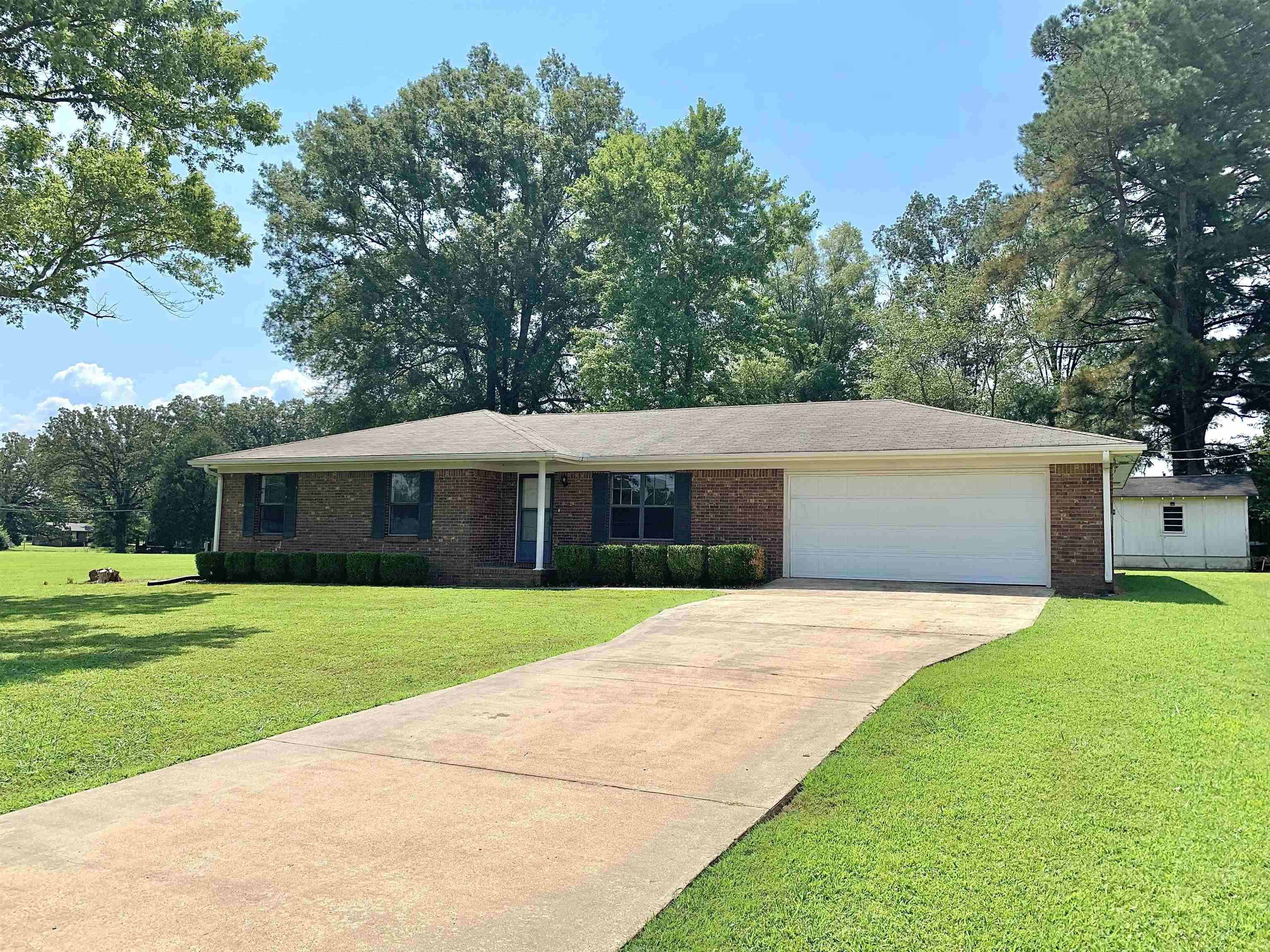 111 Robin Court Middleton, TN 38052 - Photo 21 of 23 a front view of house with yard and green space