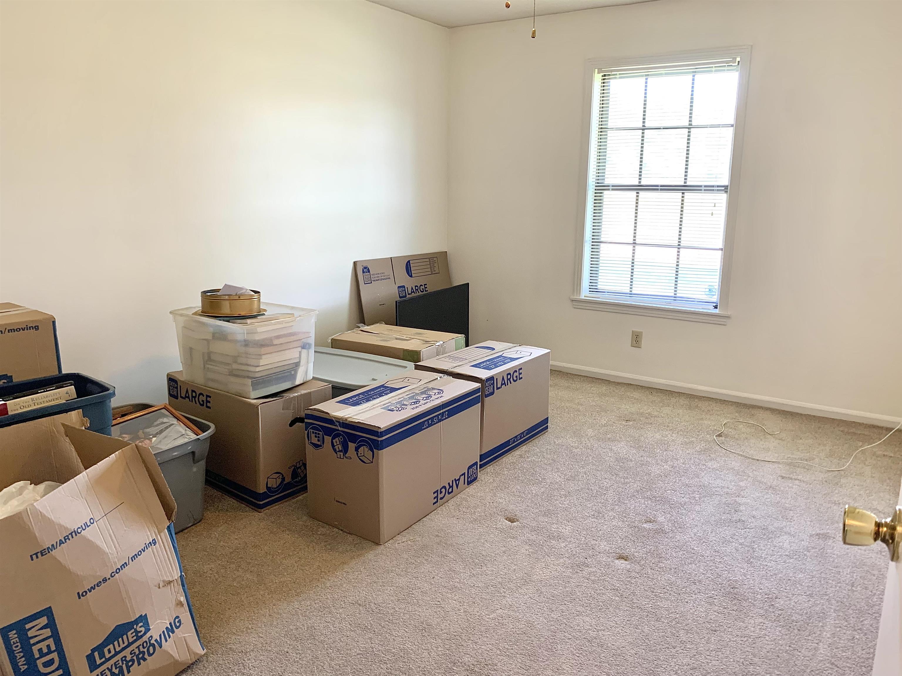 111 Robin Court Middleton, TN 38052 - Photo 10 of 23 a living room with furniture and a window