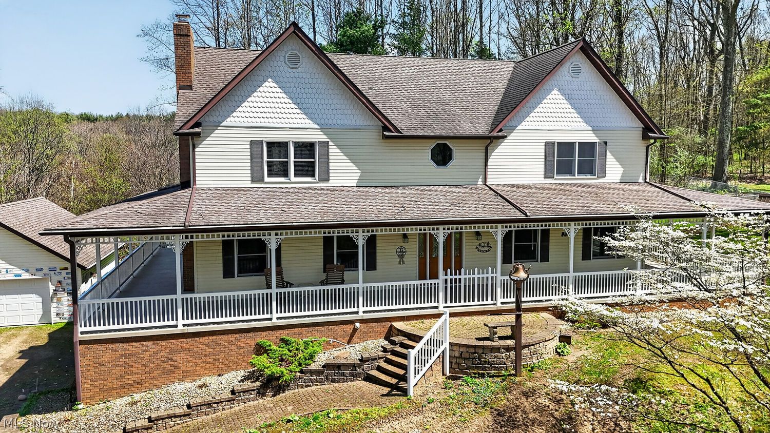 5042 Shawnee Road Carrollton, OH 44615 - Photo 2 of 48 Enjoy the sounds of nature in the 4-6 person hot tub on the porch