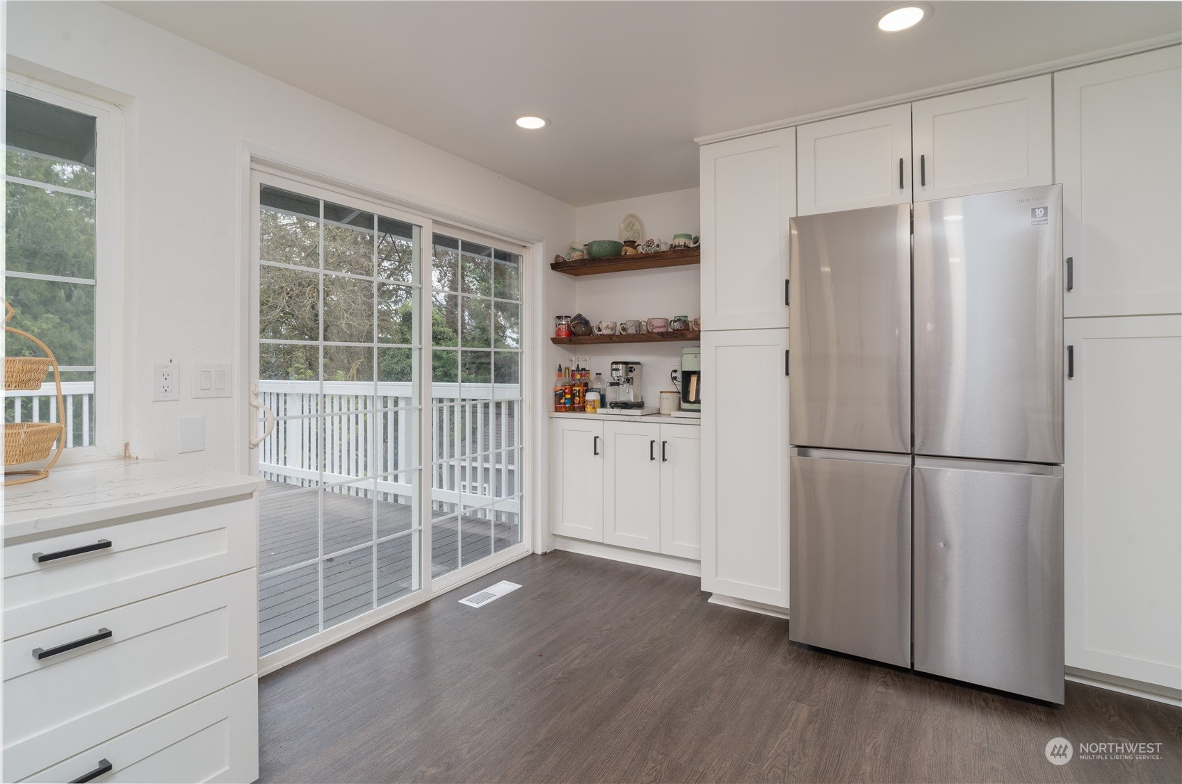 172 Brockway Road Chehalis, WA 98532 - Photo 14 of 33 a view of a kitchen with refrigerator and wooden floor