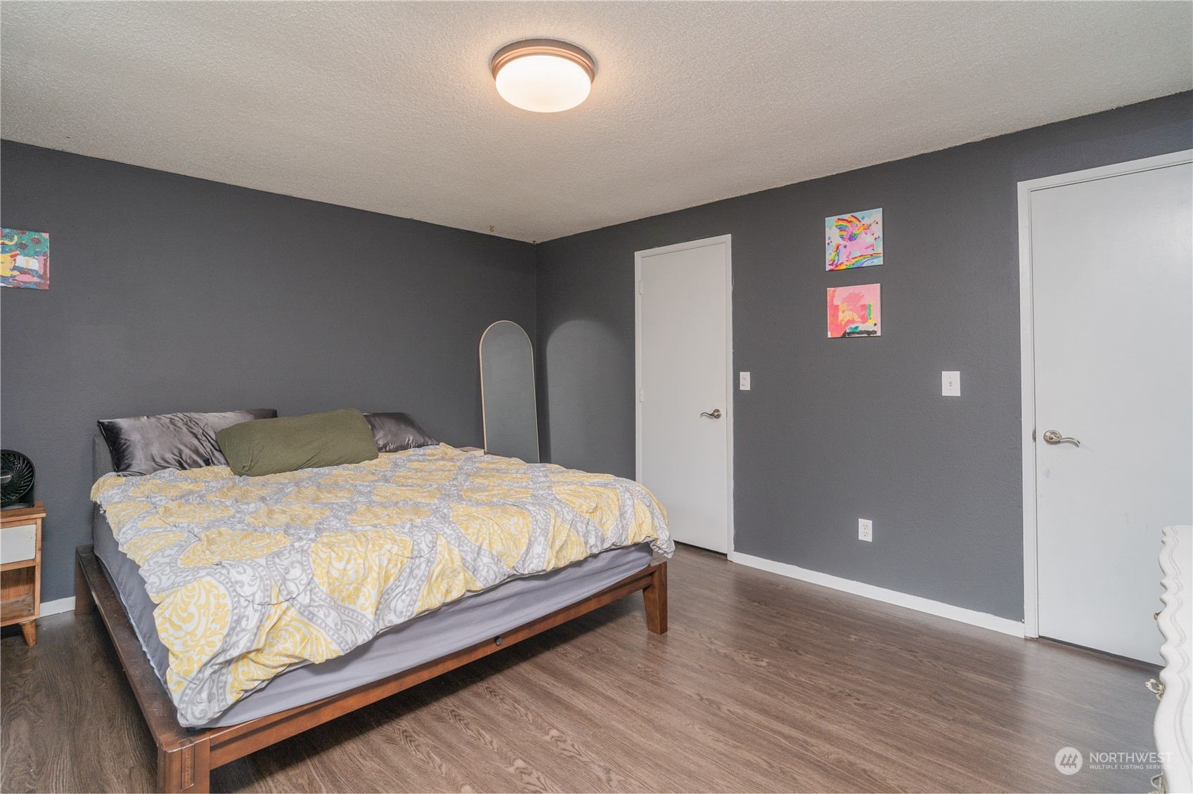 172 Brockway Road Chehalis, WA 98532 - Photo 16 of 33 a bed sitting in a spacious bedroom next to a bathroom
