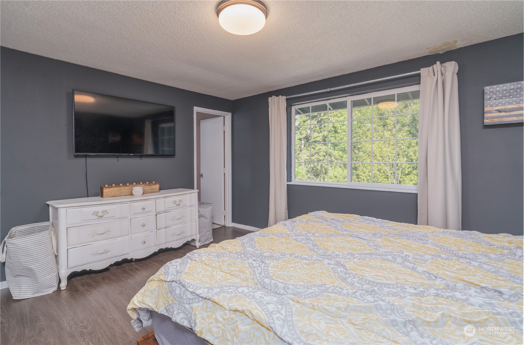 172 Brockway Road Chehalis, WA 98532 - Photo 18 of 33 a bedroom with a bed and a flat screen tv