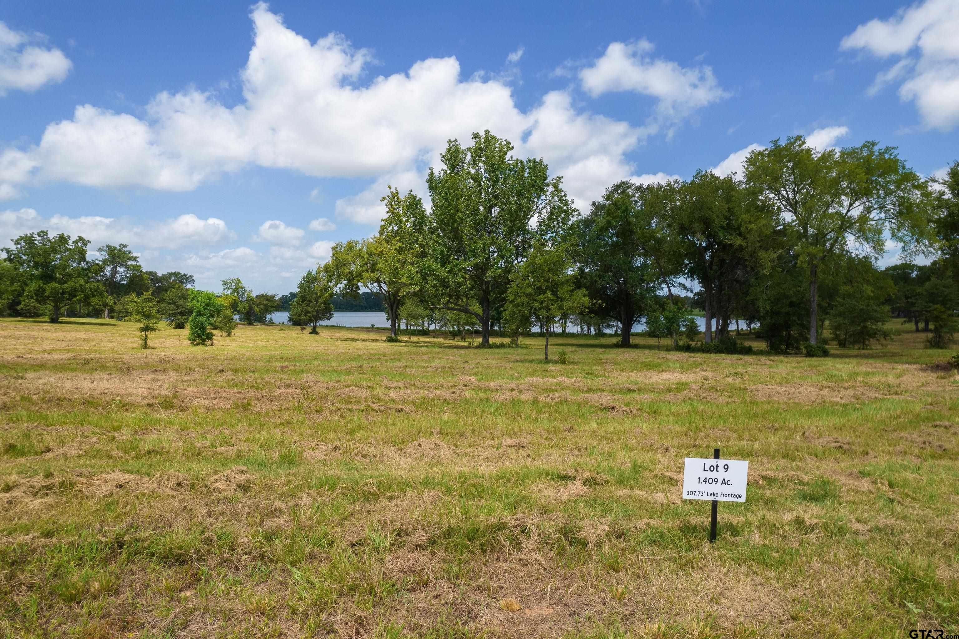 Tbd Lot 9 Tbd Way Mount Pleasant, TX 75455 - Photo 3 of 13 a swimming pool with outdoor seating and yard