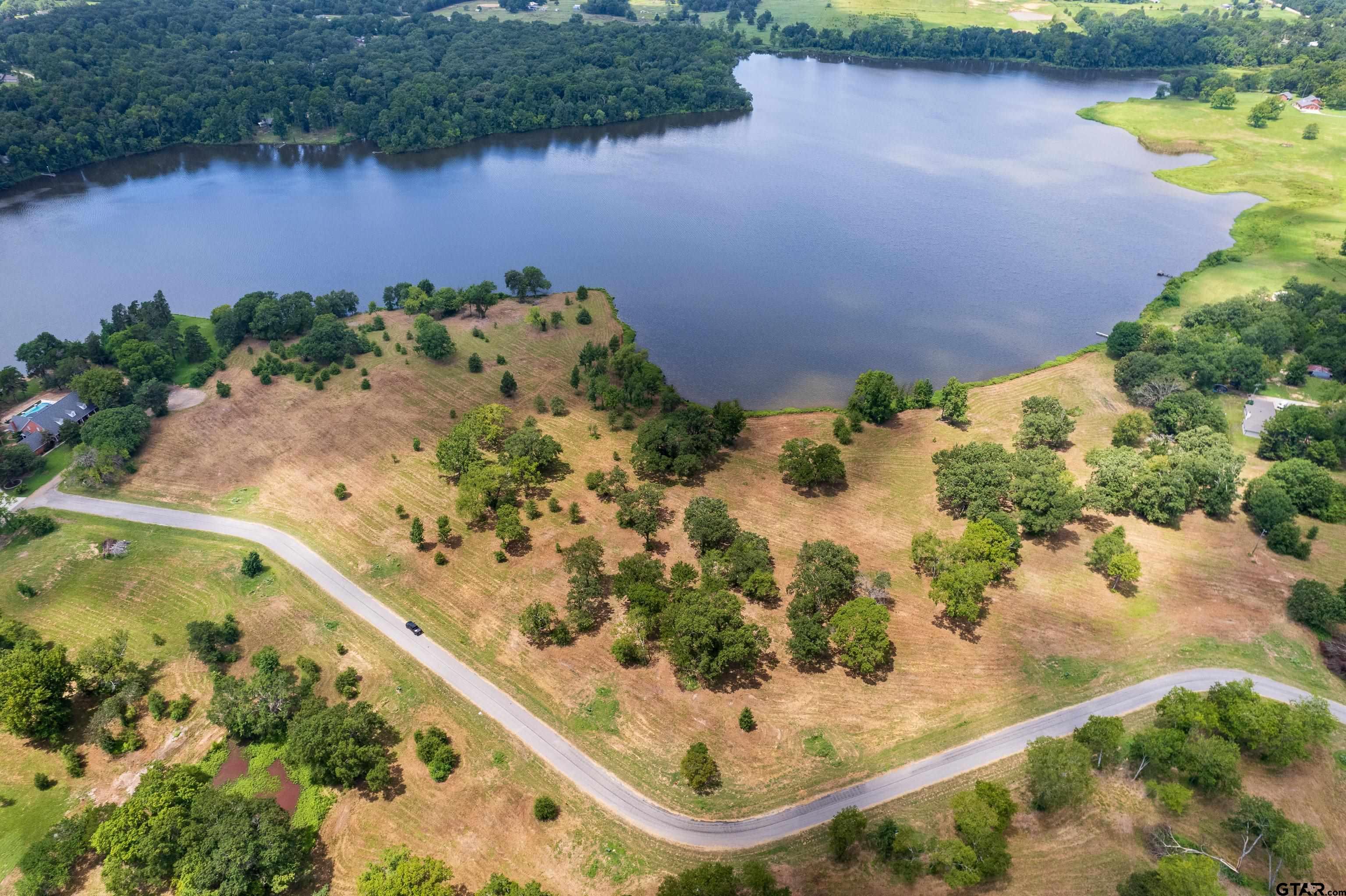 Tbd Lot 9 Tbd Way Mount Pleasant, TX 75455 - Photo 7 of 13 a view of a lake