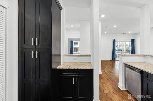 a view of a kitchen cabinets and dining room