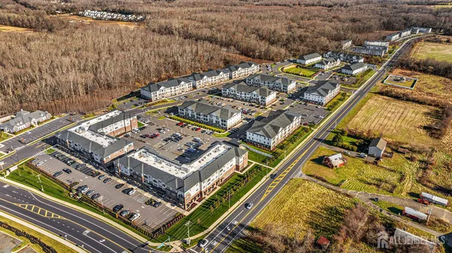 a view of swimming pool with outdoor seating area