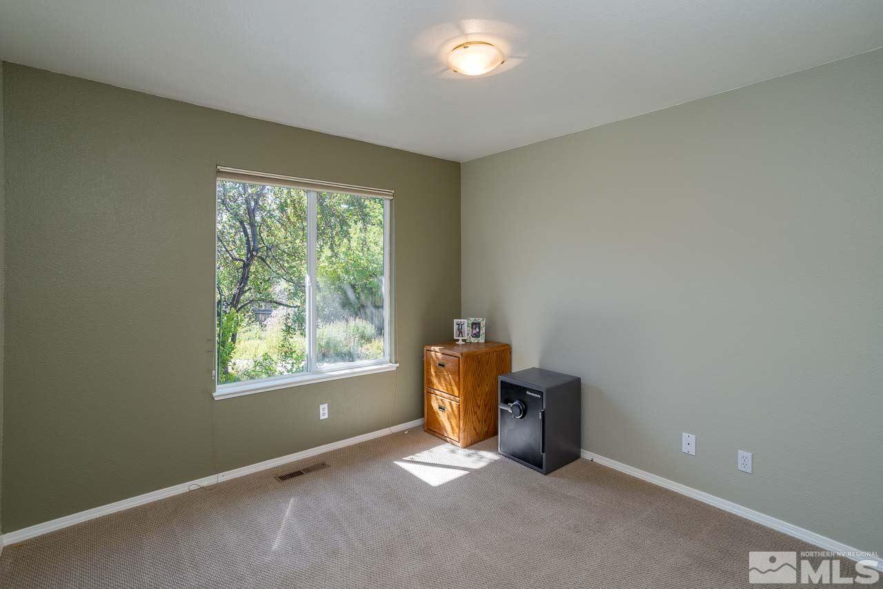 2139 Inca Dove Court Sparks, NV 89441 - Photo 14 of 25 a room with furniture and a window