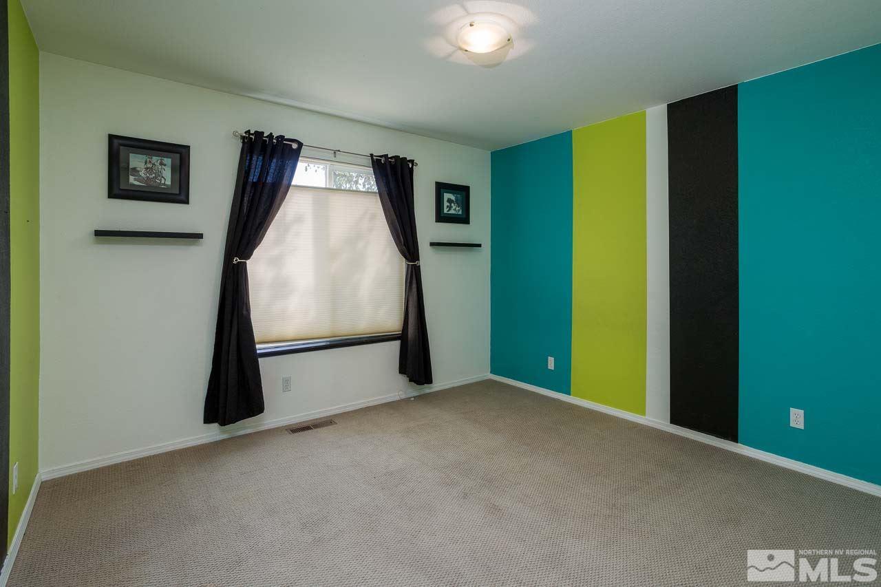 2139 Inca Dove Court Sparks, NV 89441 - Photo 15 of 25 a view of a room with gym equipment and a window