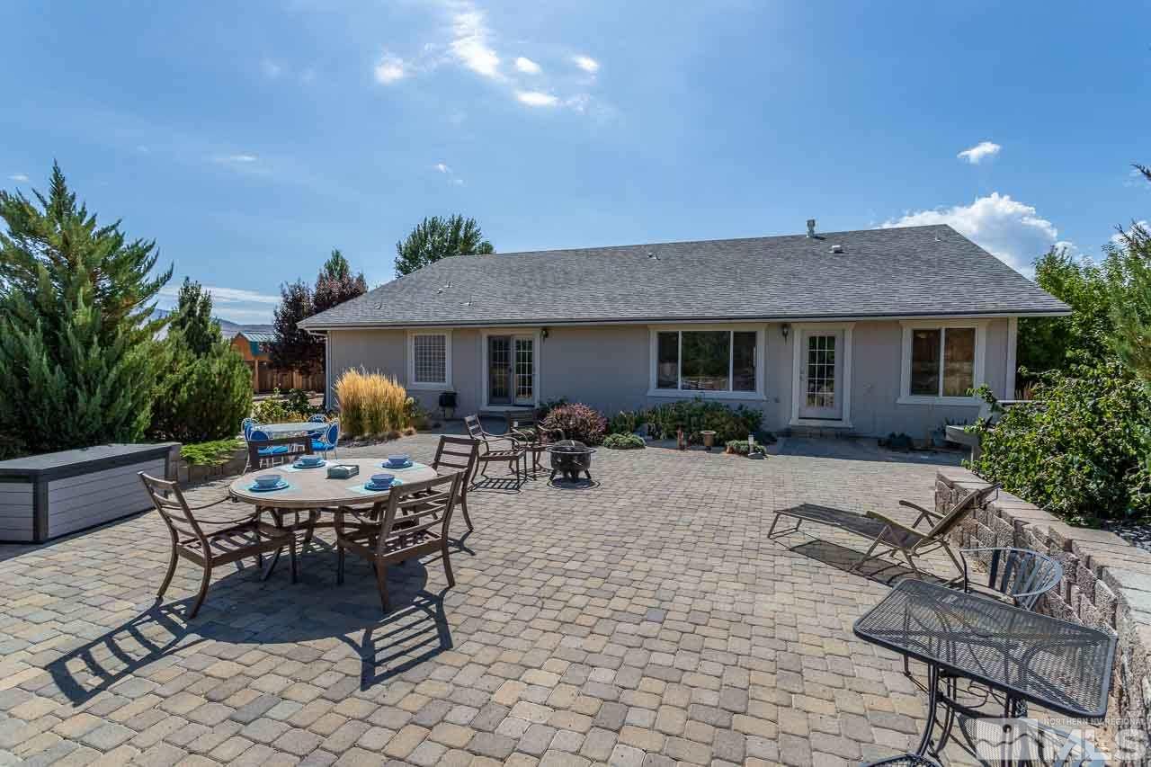 2139 Inca Dove Court Sparks, NV 89441 - Photo 19 of 25 a view of a house with backyard sitting area and garden