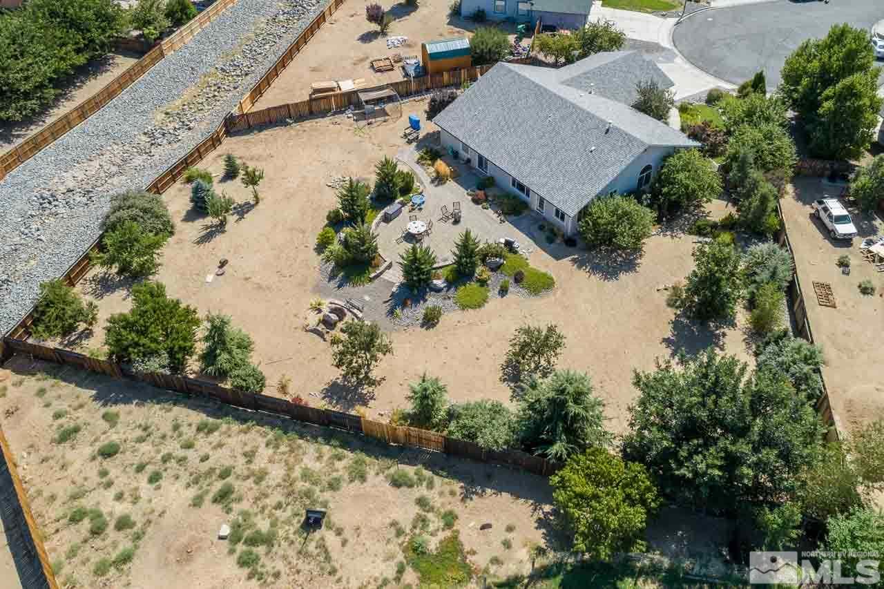 2139 Inca Dove Court Sparks, NV 89441 - Photo 24 of 25 an aerial view of a house with a yard and mountain view in back