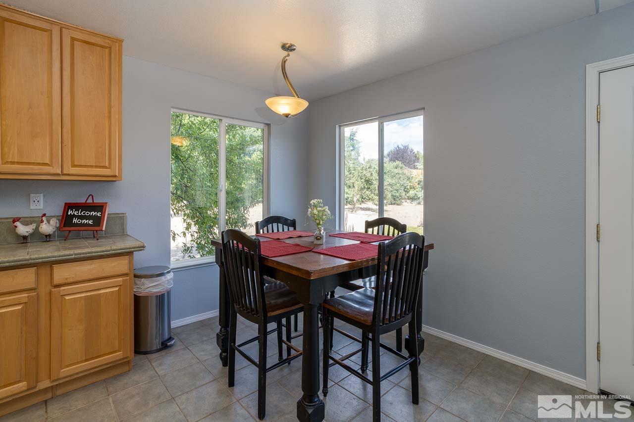 2139 Inca Dove Court Sparks, NV 89441 - Photo 7 of 25 a dining room with furniture and window